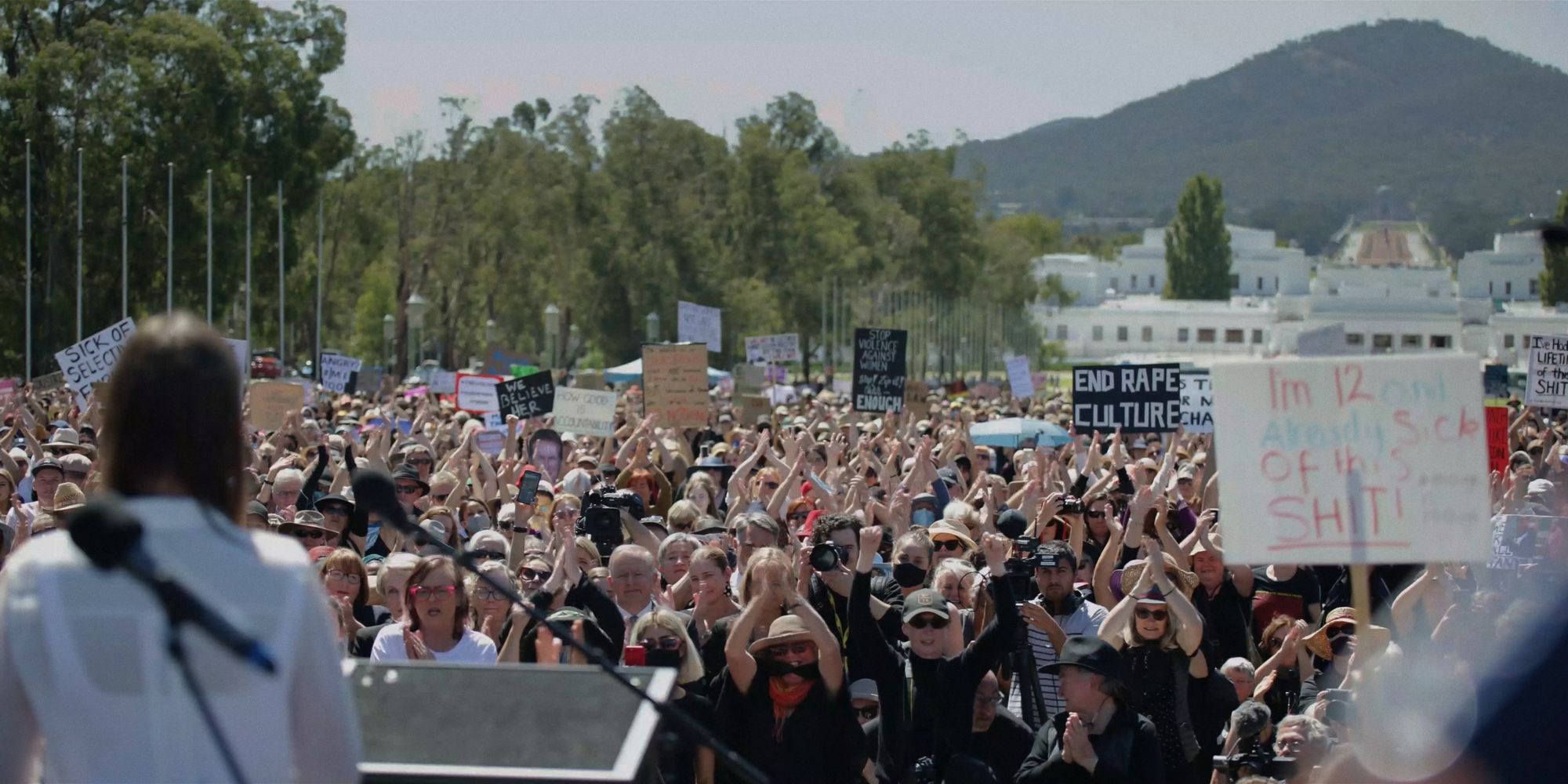 Brittany Higgins addresses crowd of protesters outside Parliament House Canberra in Silenced documentary