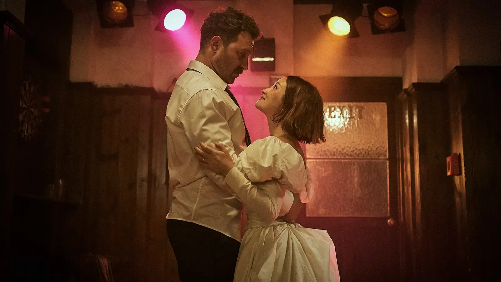 Jai Courtney and Emily Browning dance together in a scene from Australian film The Fox